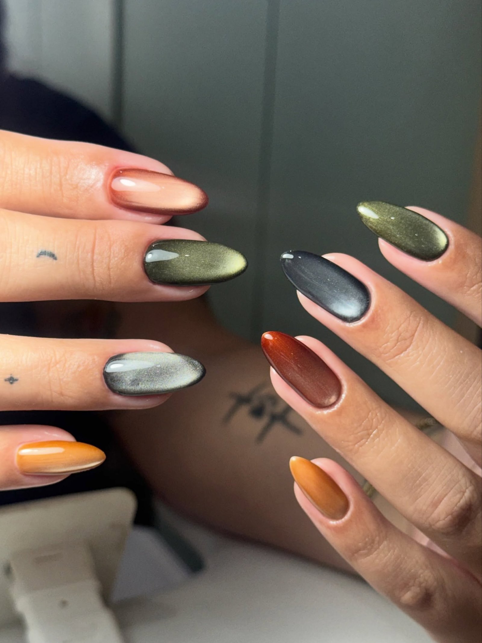 Muted Fall Almond Nails in Green, Orange, and Blue