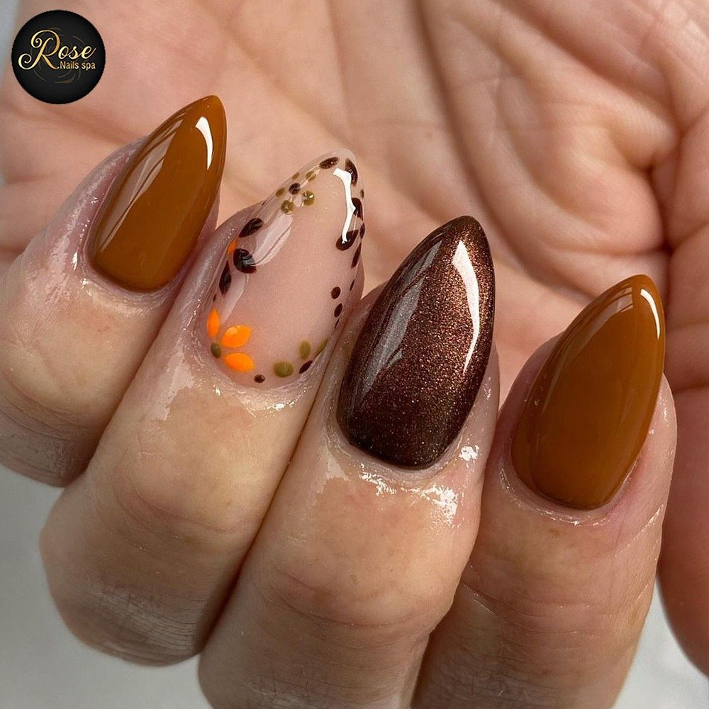 Brown, Caramel, and Nude Almond Nails with Tiny Orange Details