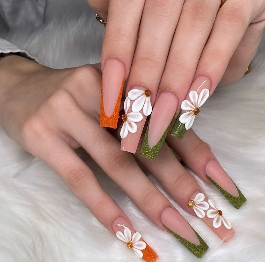 Brown and Green Nails with White Floral Accents