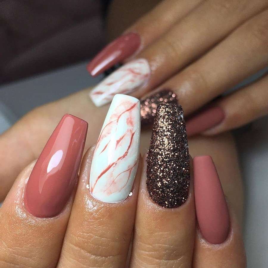 Pink Nails with Marble and Dark Glitter Accents