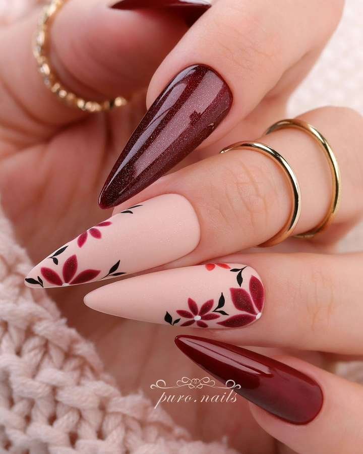 Deep Red and Cream Nails with Abstract Leaf Details