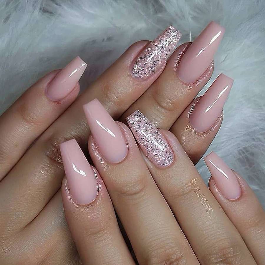 Soft Pink Almond Nails with Glitter Accents