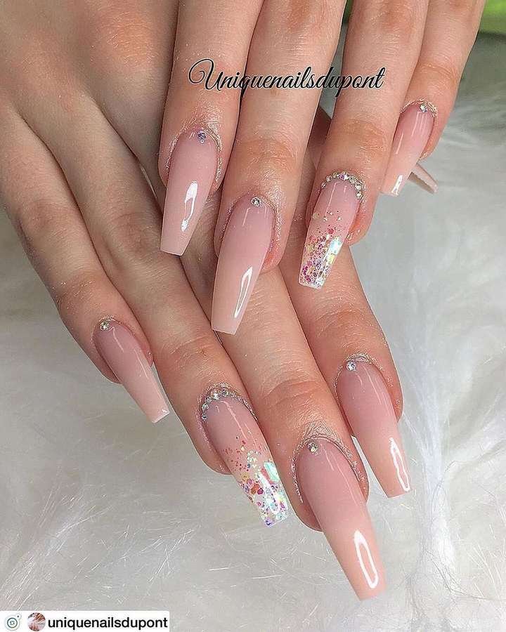 Long Nude Nails with Fine Glitter Accents