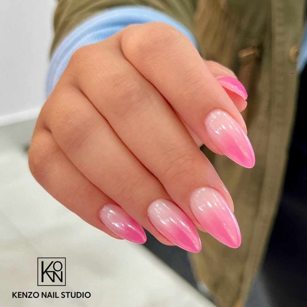 Glossy Pink Chrome Almond Nails