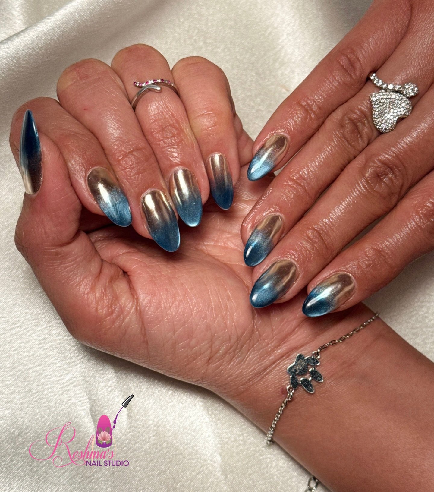 Blue Metallic Chrome Ombre Almond Nails