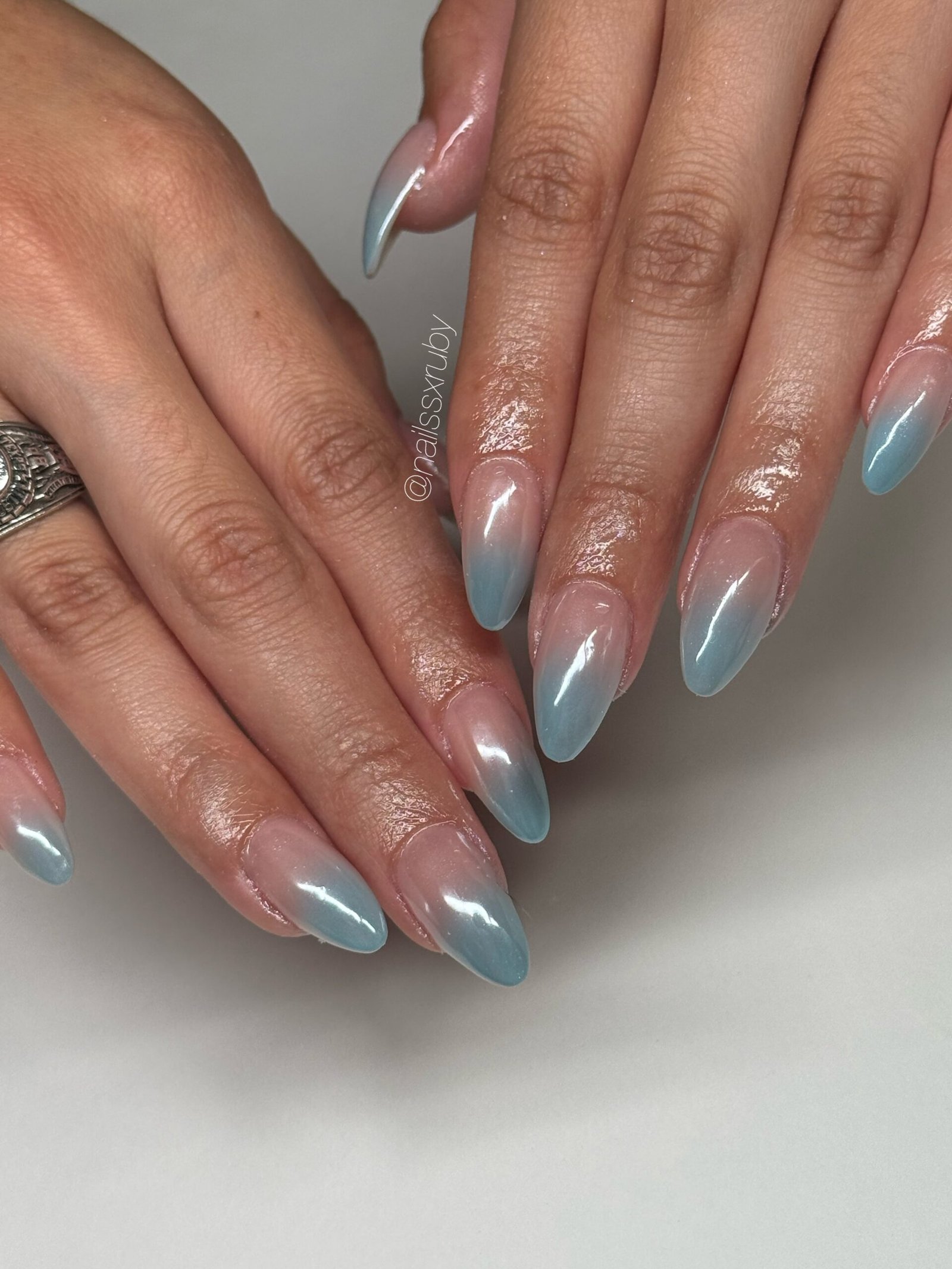 Icy Blue Chrome Ombre Almond Nails