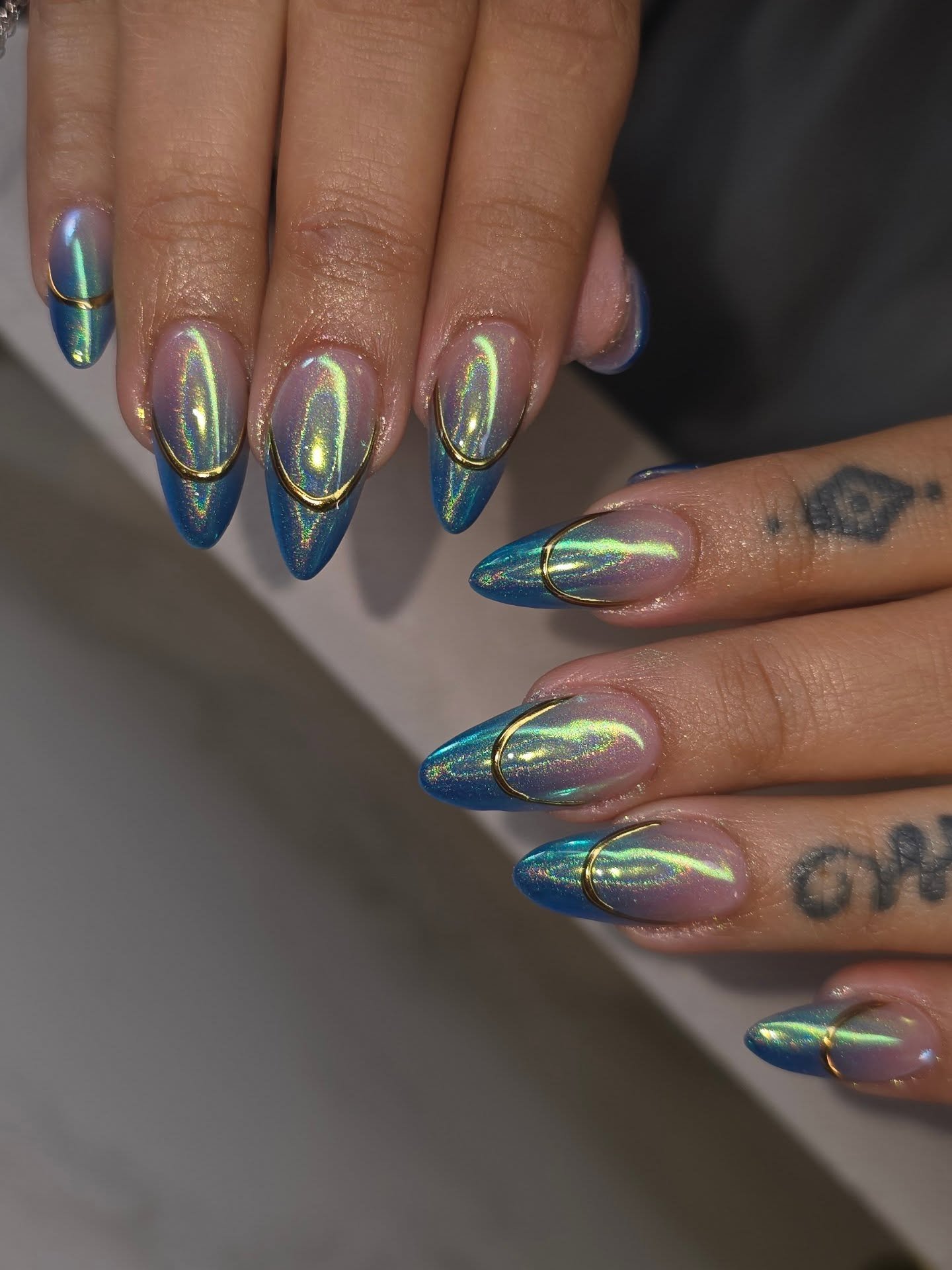 Blue Green Reflective Chrome Almond Nails