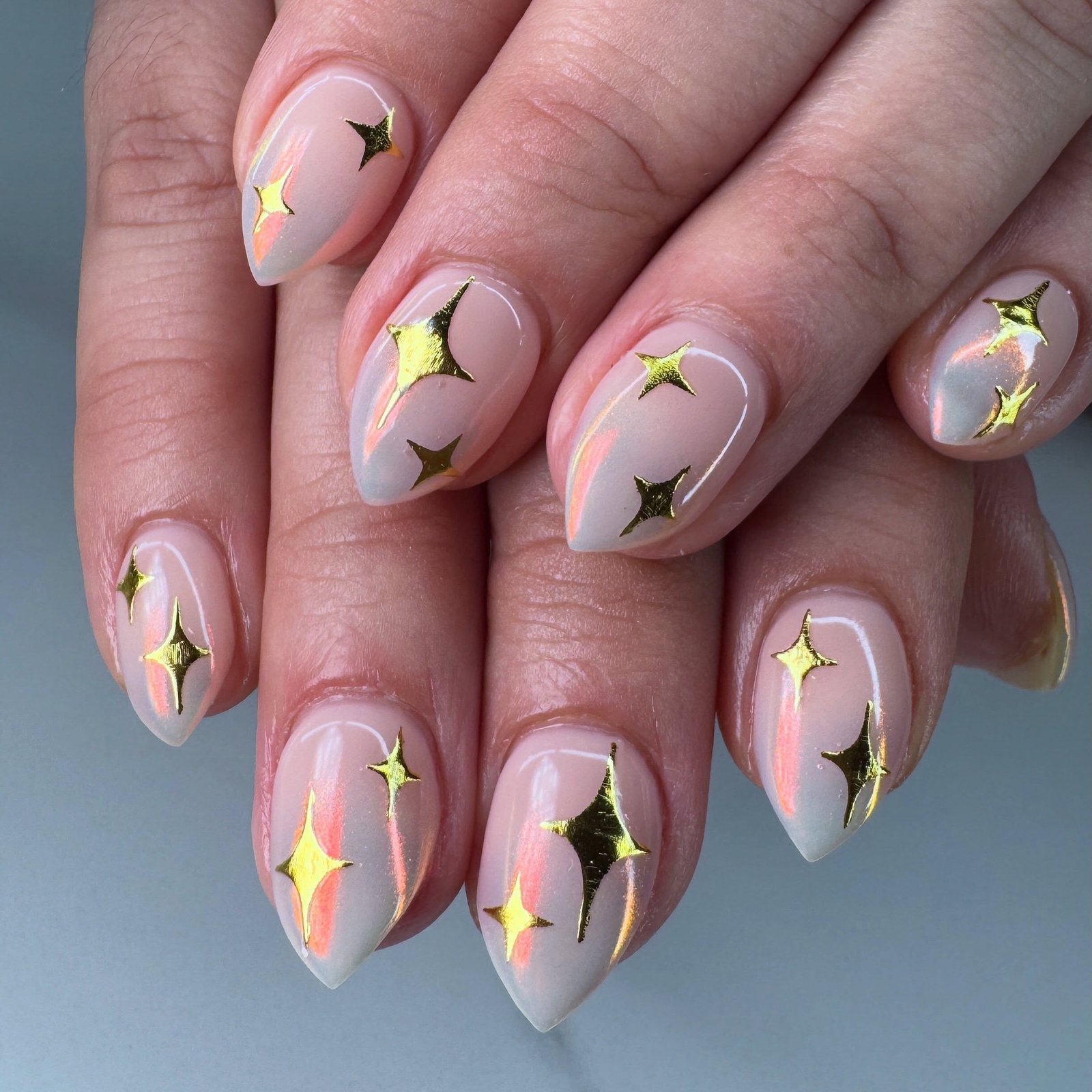 Pink Nail Art with Green and Yellow Accents
