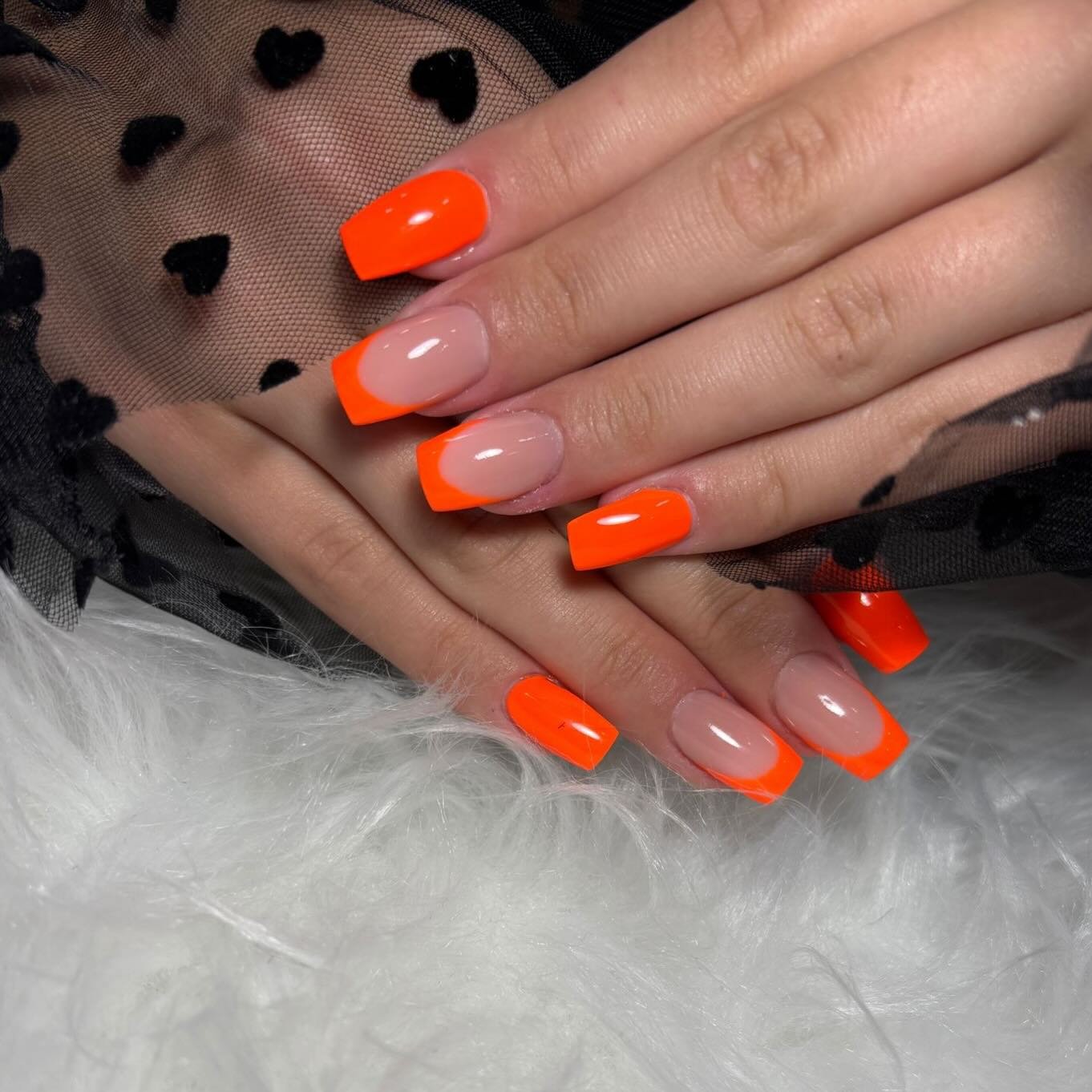 Bright Orange French Tips with Black Heart Details nail design