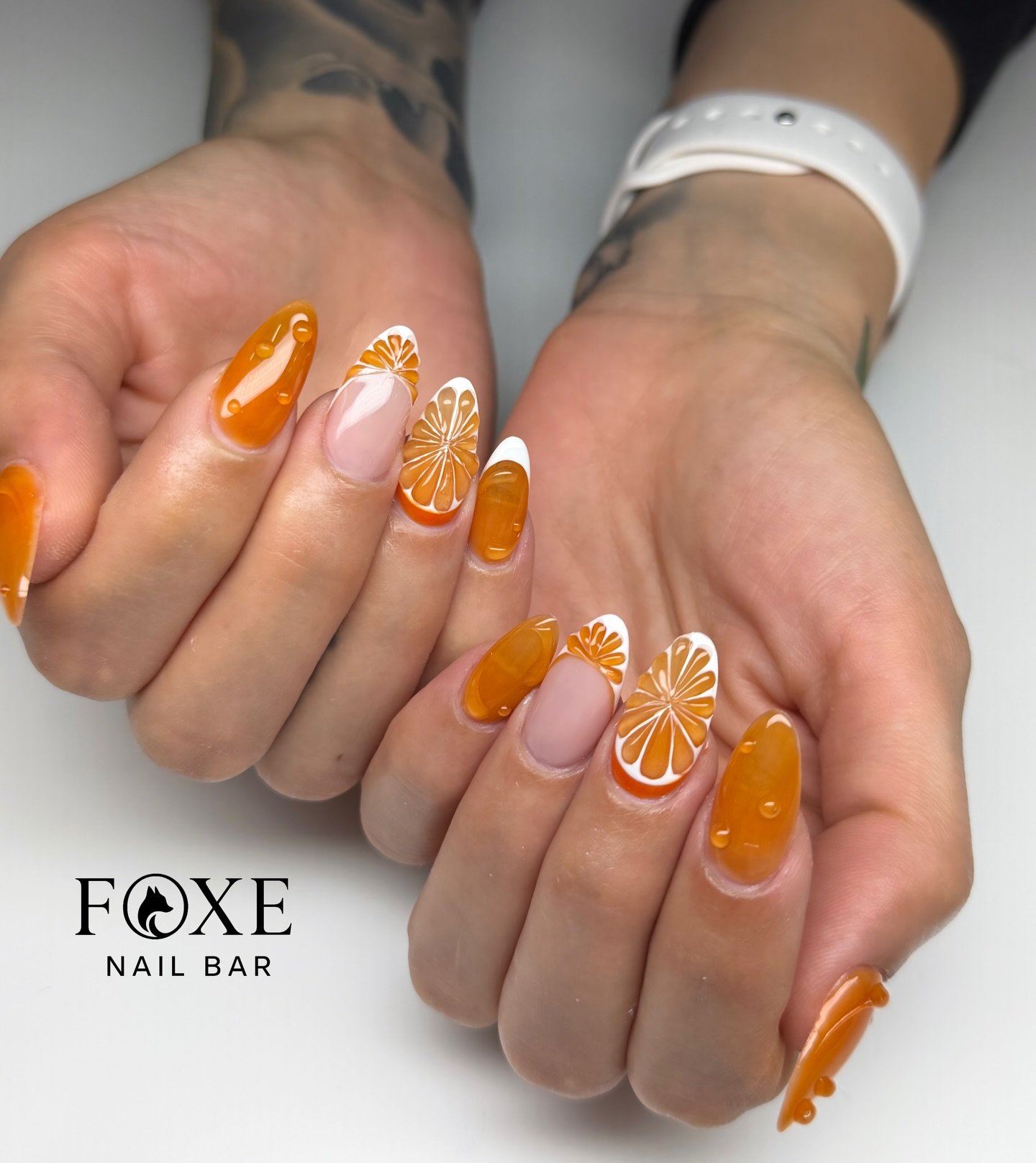 Orange French Tips with Sunburst Details nail design