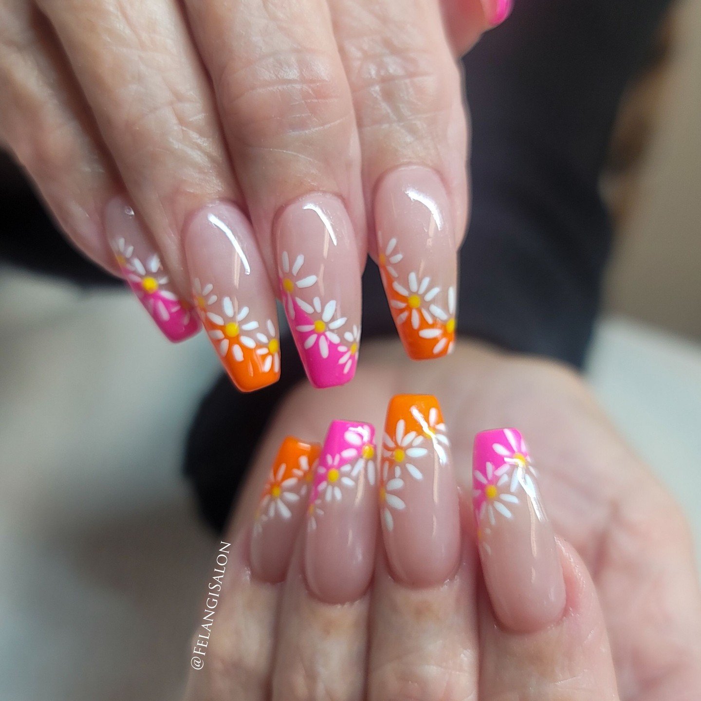 Orange and Pink French Tips with Daisy Accents nail design