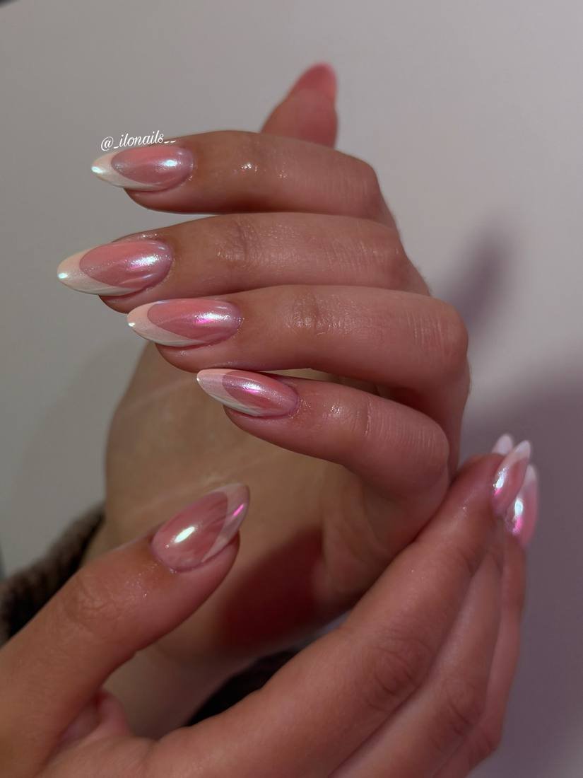 Glossy Pink Almond Nails with Curved Pearl Tips