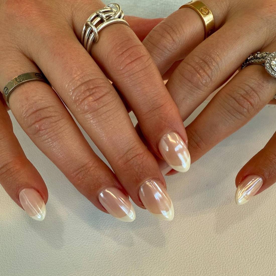 Sheer Nude Almond Nails with Iridescent White Tips