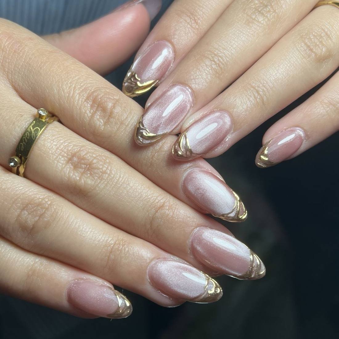 Blush Almond Nails with Gold-Tinted Pearl Tips