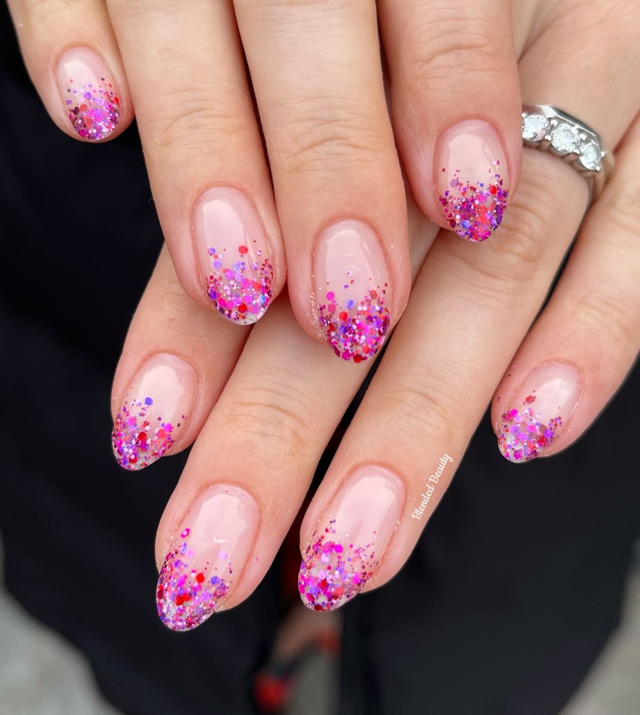 Sheer Pink Nails with Colorful Glitter Tips