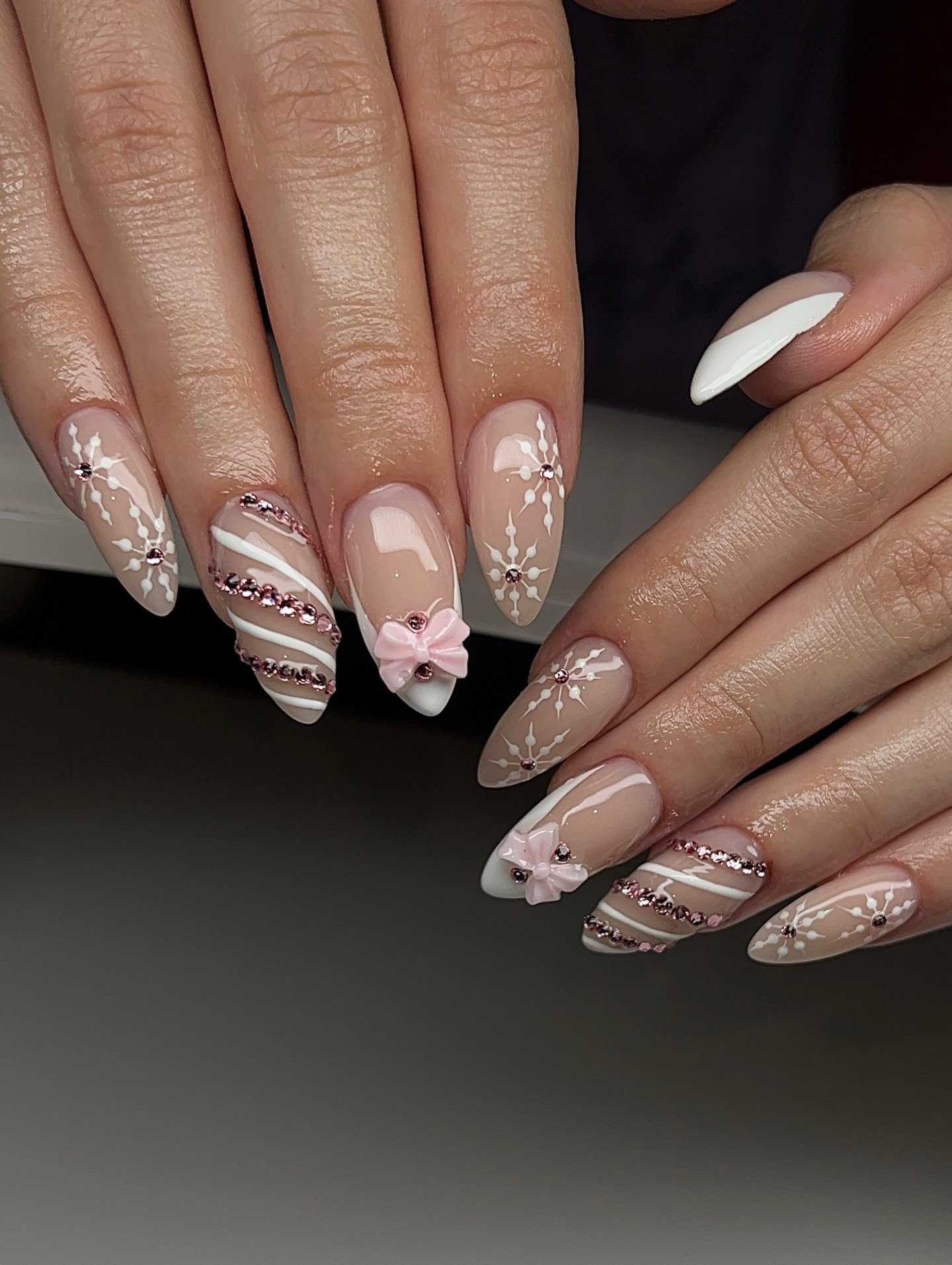 Soft Pink Almond Nails with Snowflakes, Plaid and Bow Details