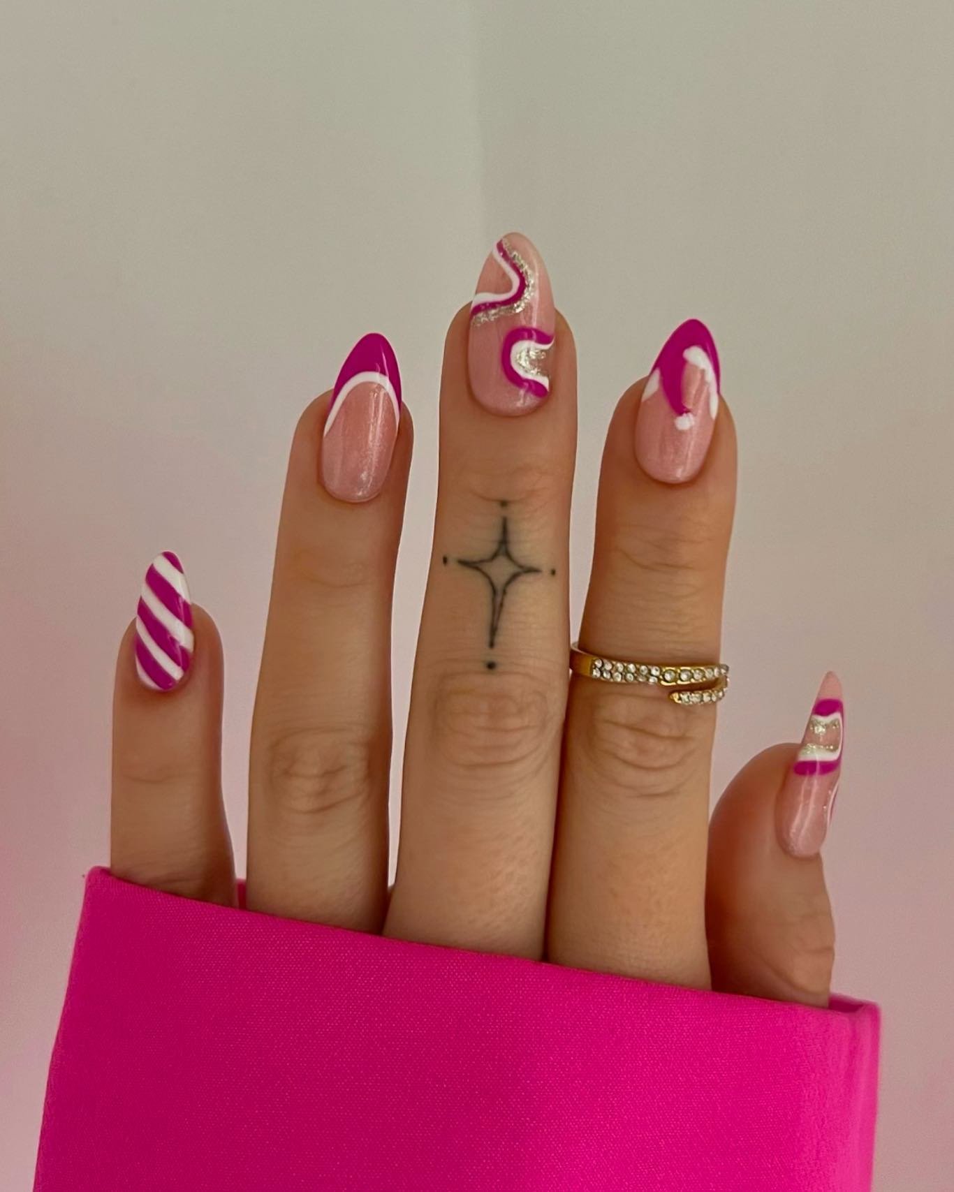 Pink and Red French Tips with Swirls and Candy Stripes