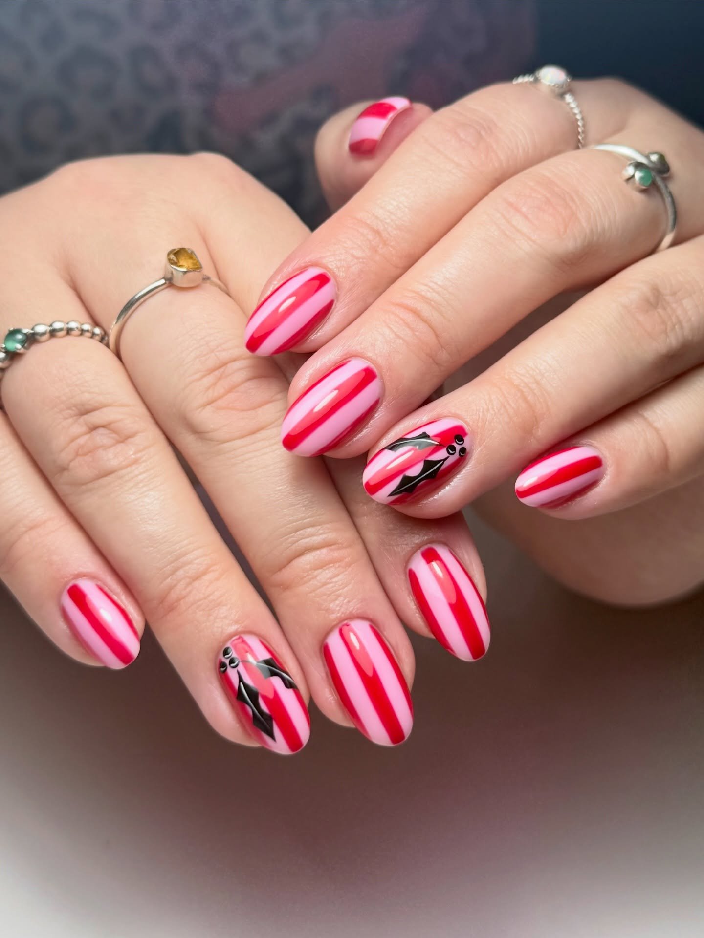 Pink and Red Striped Nails with Dark Bow Details