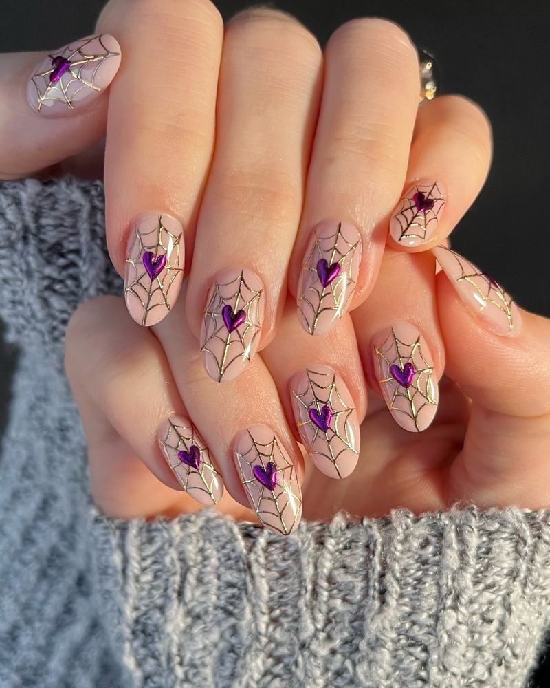 Nude Almond Nails with Purple and Gold Botanical Accents