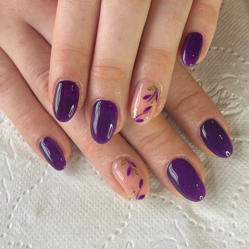 Glossy Purple Oval Nails with Marbled Accent Nails