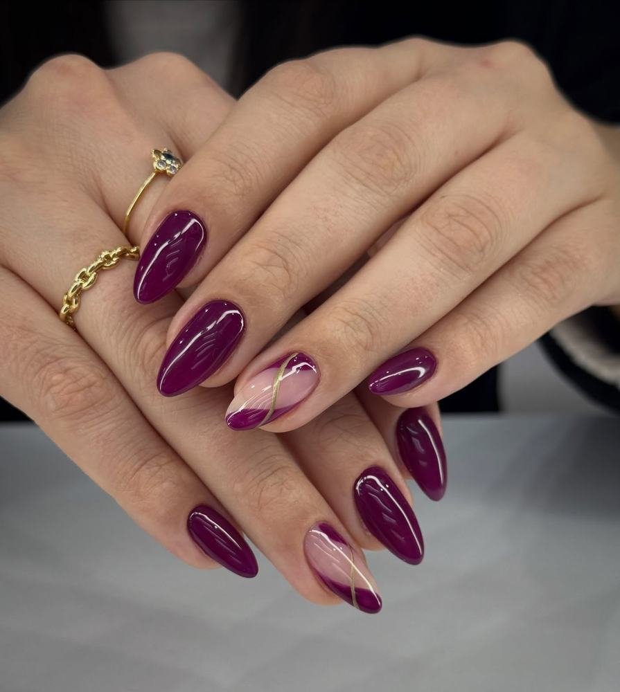 Deep Purple Almond Nails with Sheer Pink and Gold Accents