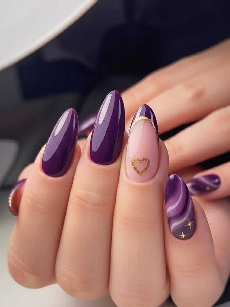 Purple Almond Nails with Gold-Tipped Accents and a Heart Detail
