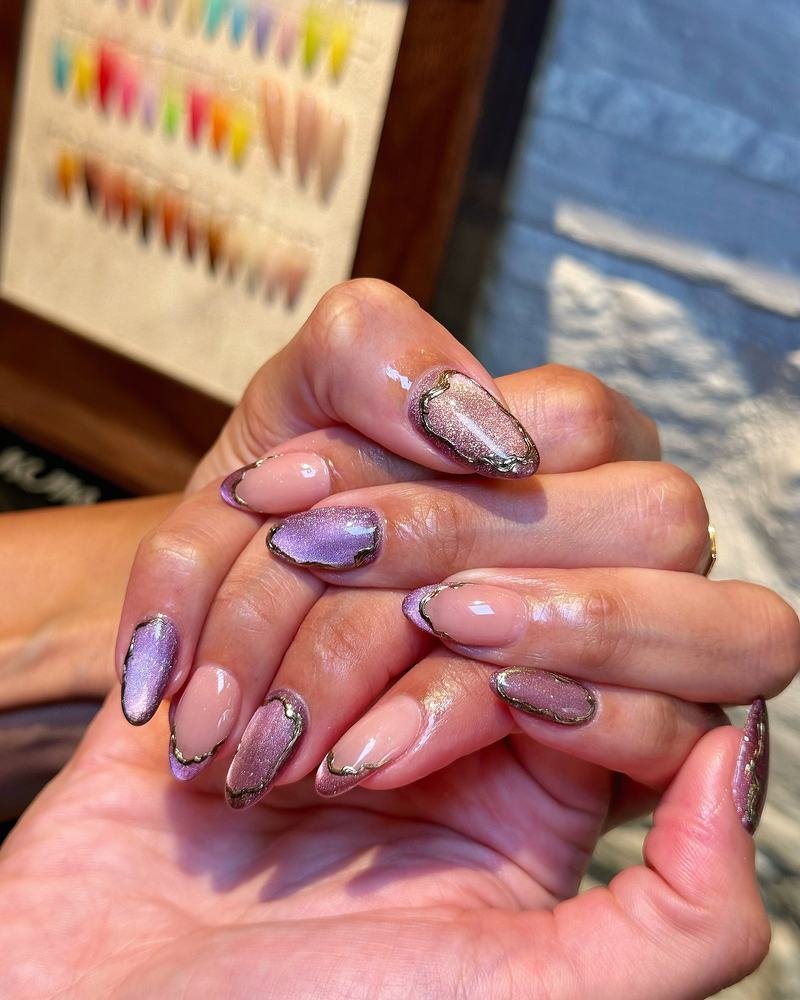 Mauve and Purple Oval Nails with Gold Accents