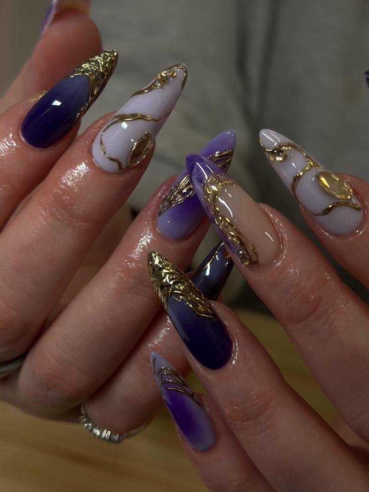 Purple Almond Nails with Gold Chain-Like Accents