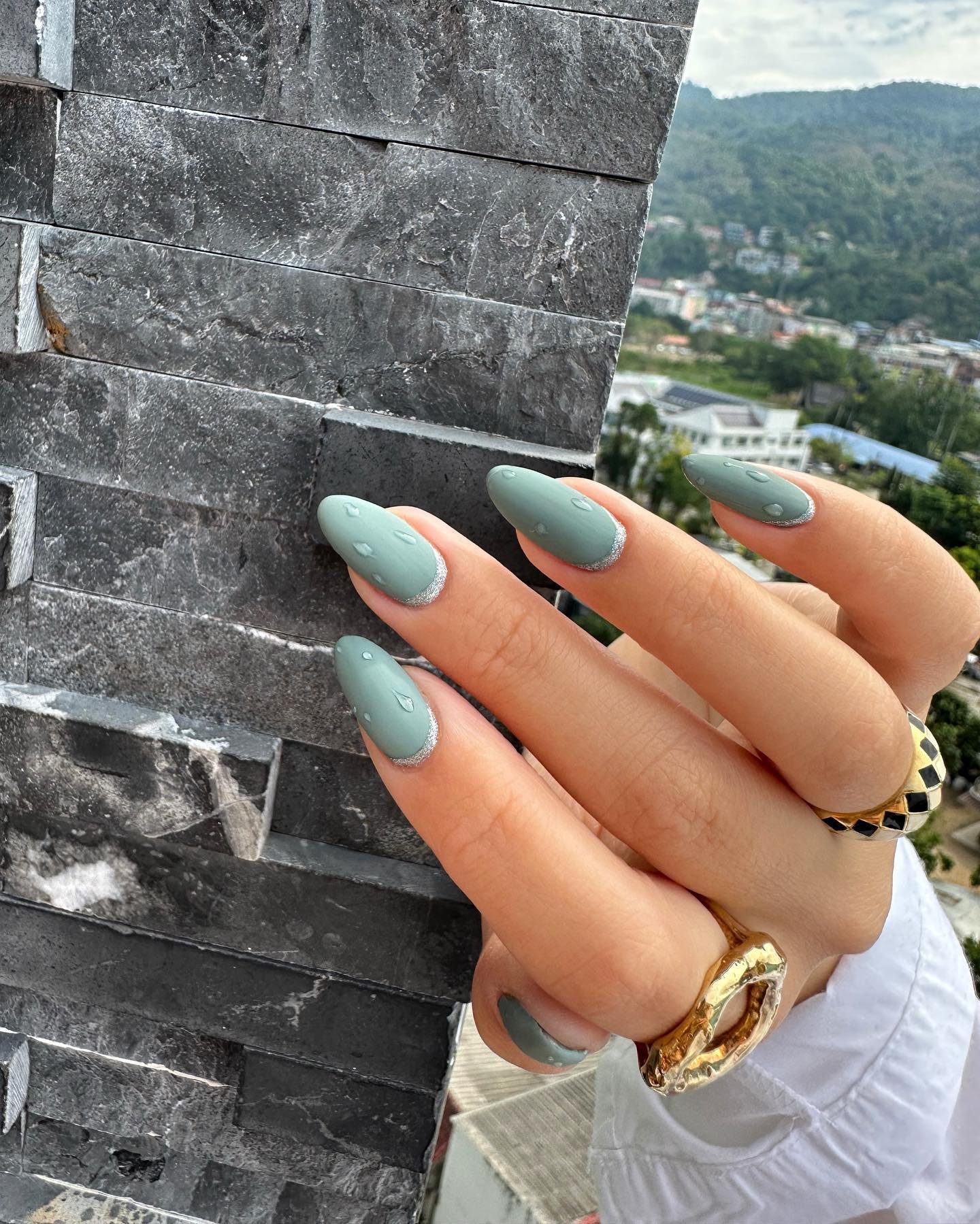 Glossy Sage Green Almond Nails