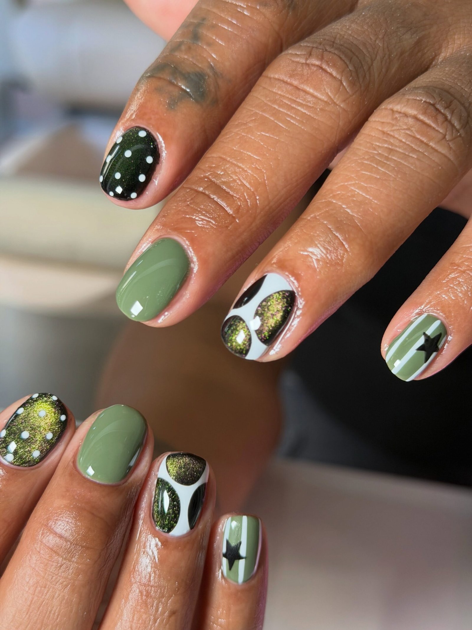 Olive Green Nails with Black and White Accents