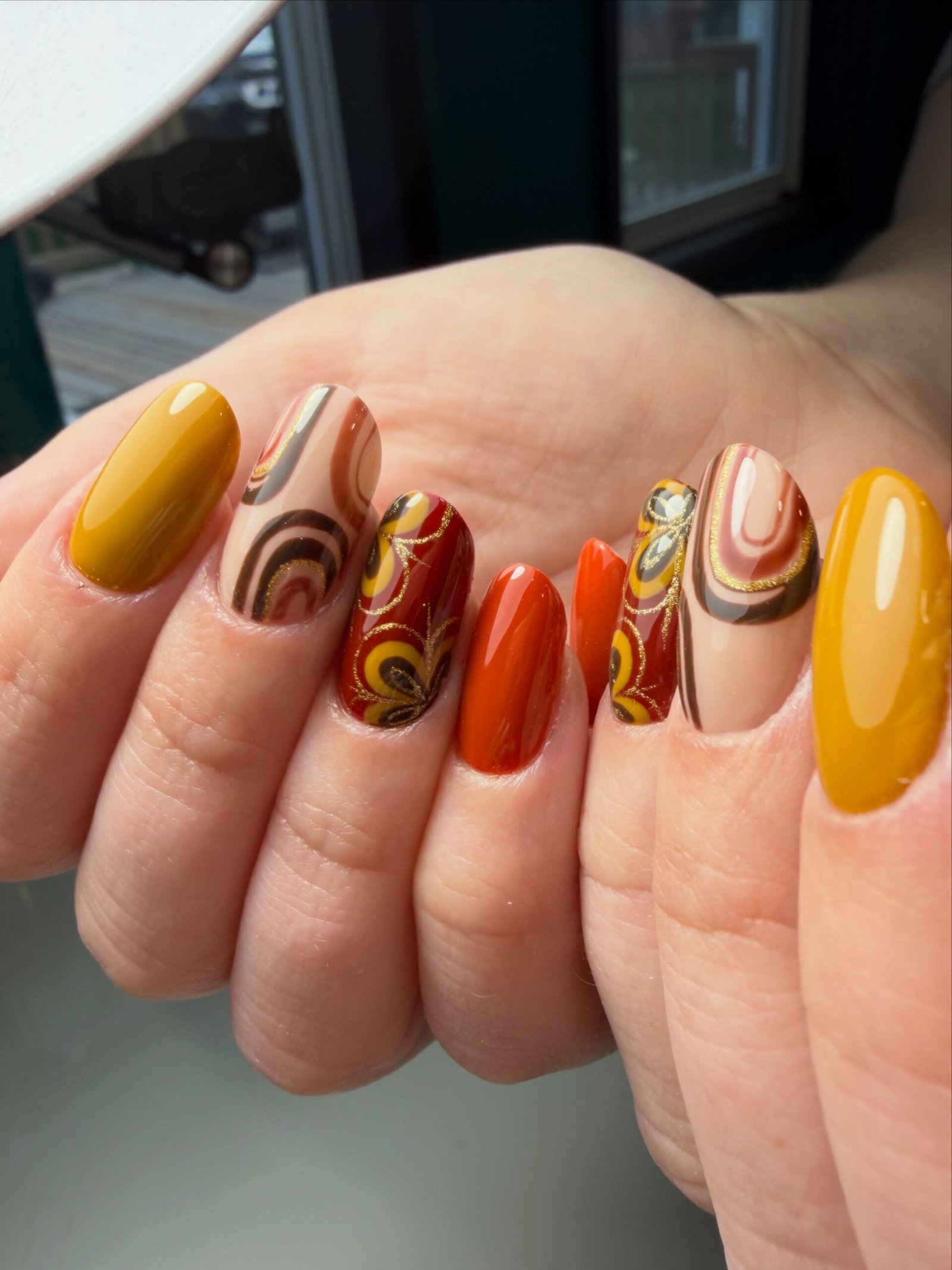 Mustard Yellow Nails with Multicolor Swirl Art