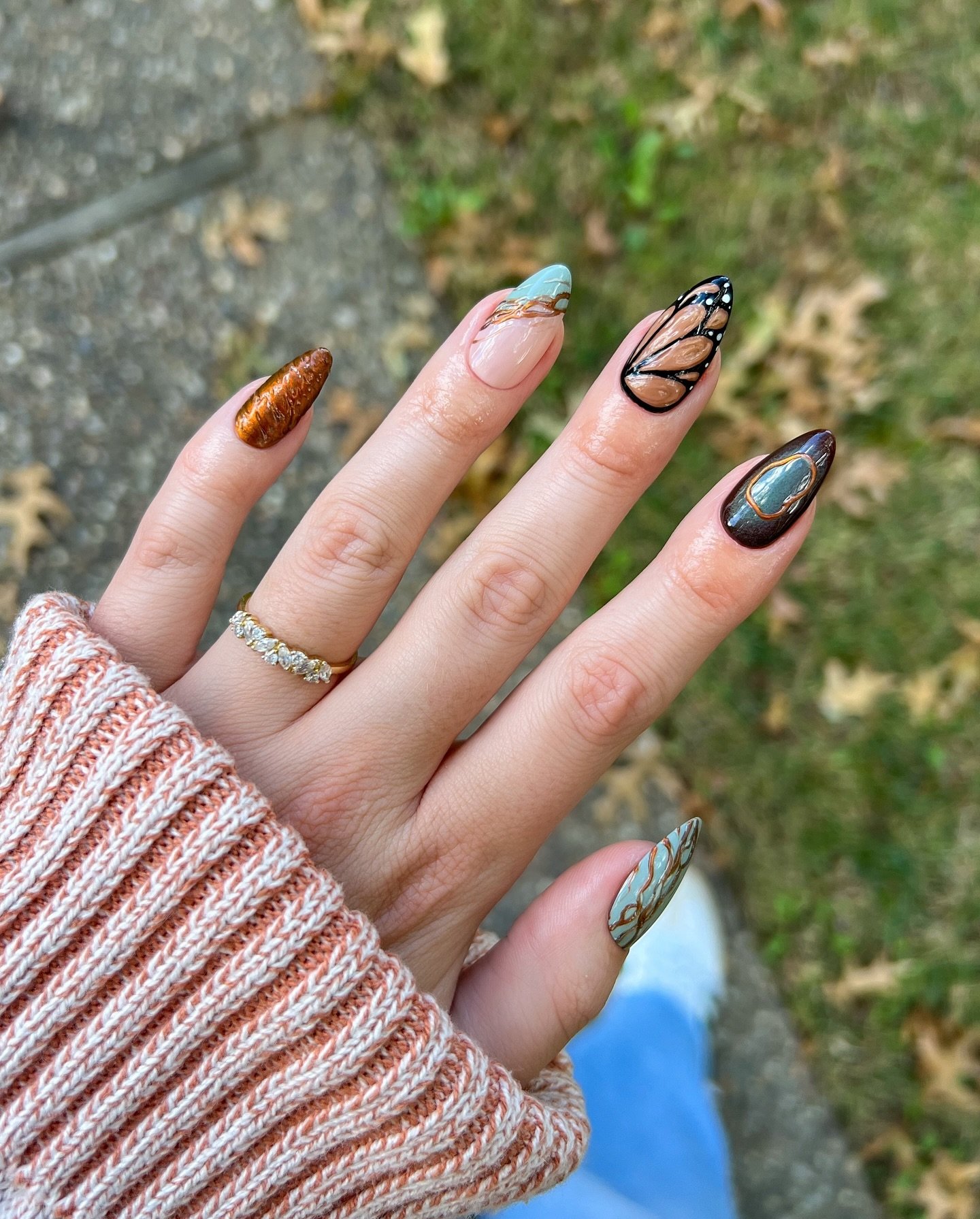 Autumn Brown and Orange Almond Nails with Fine Line Details