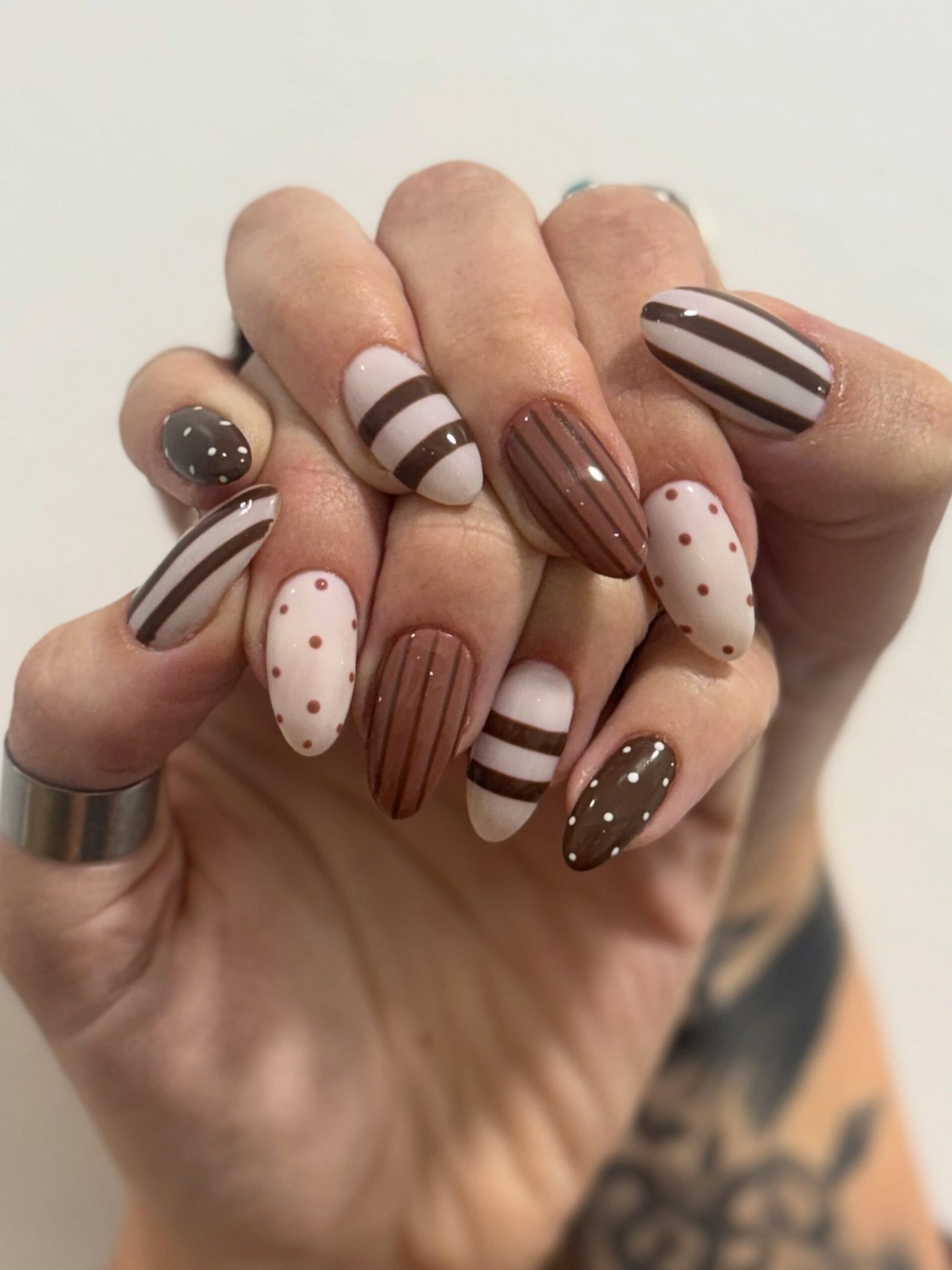 Brown and Nude Nails with Stripes and Dotted Details