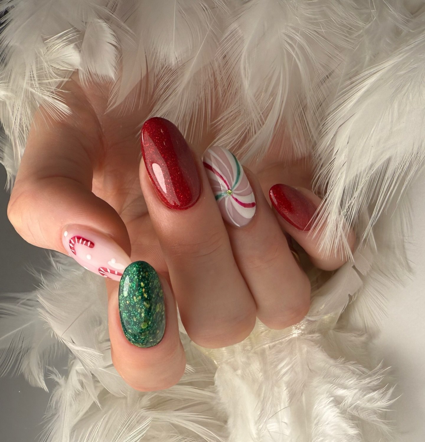 Red and Green Holiday Nails with White and Glitter Accents