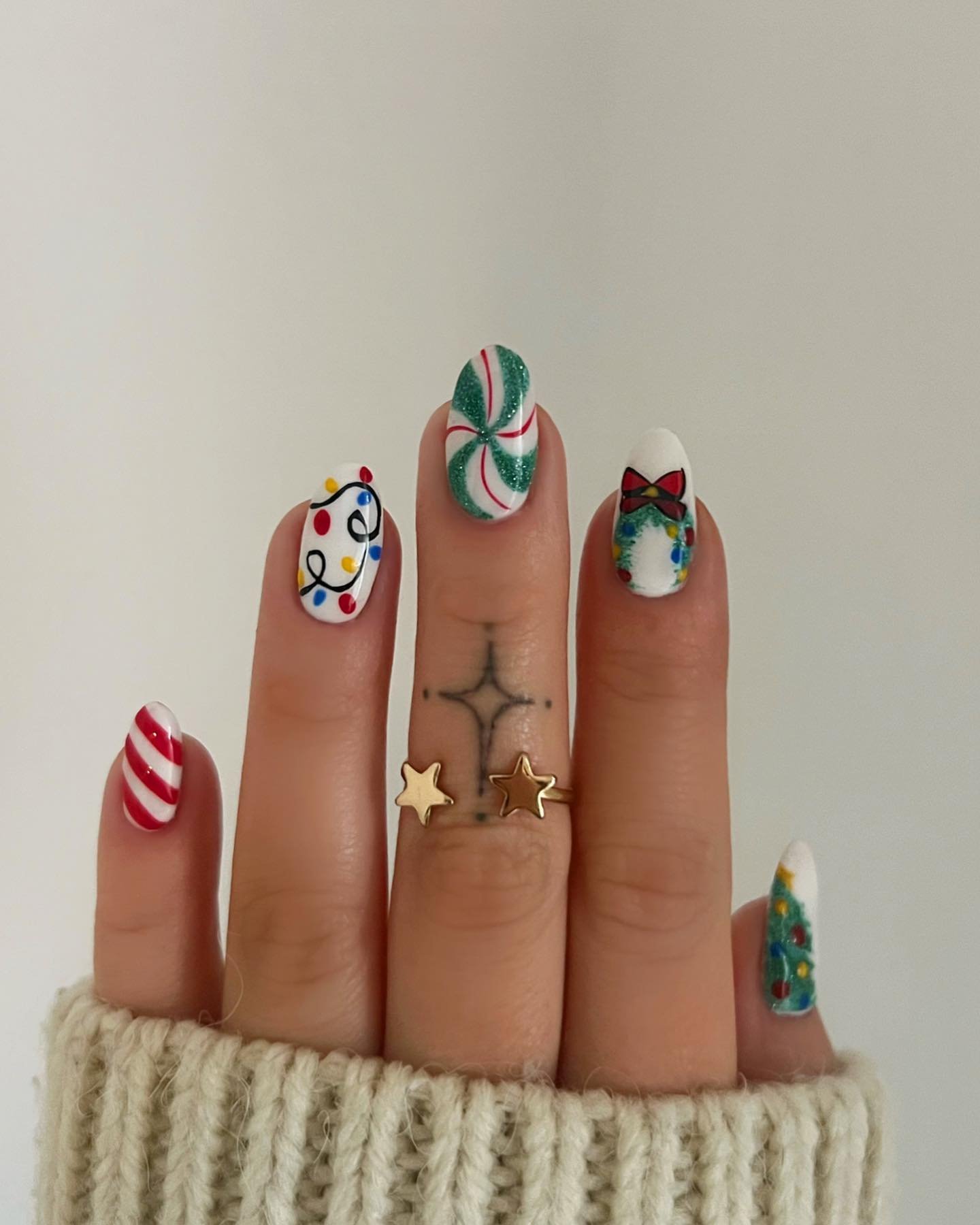 Red and Green Christmas Nails with Candy-Cane and Star Details