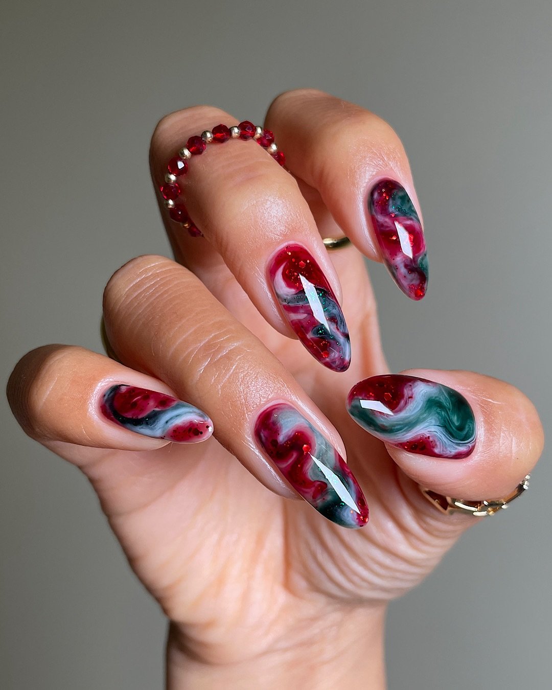 Red and Green Abstract Swirl Nails