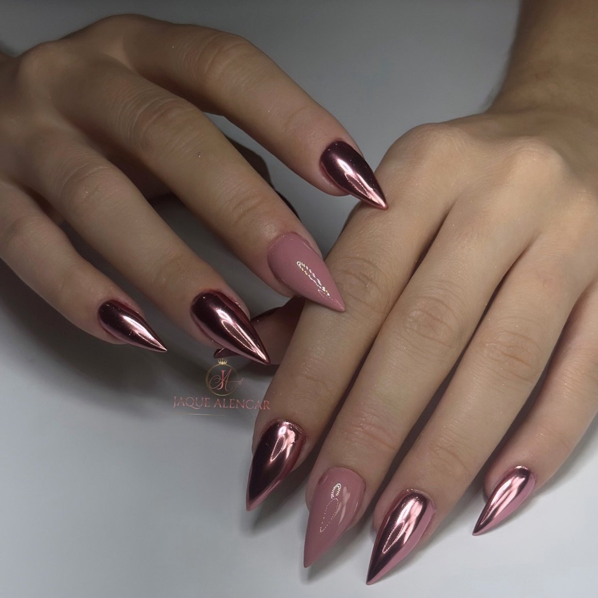 Mauve Stiletto Nails with Reflective Rose Gold Accents