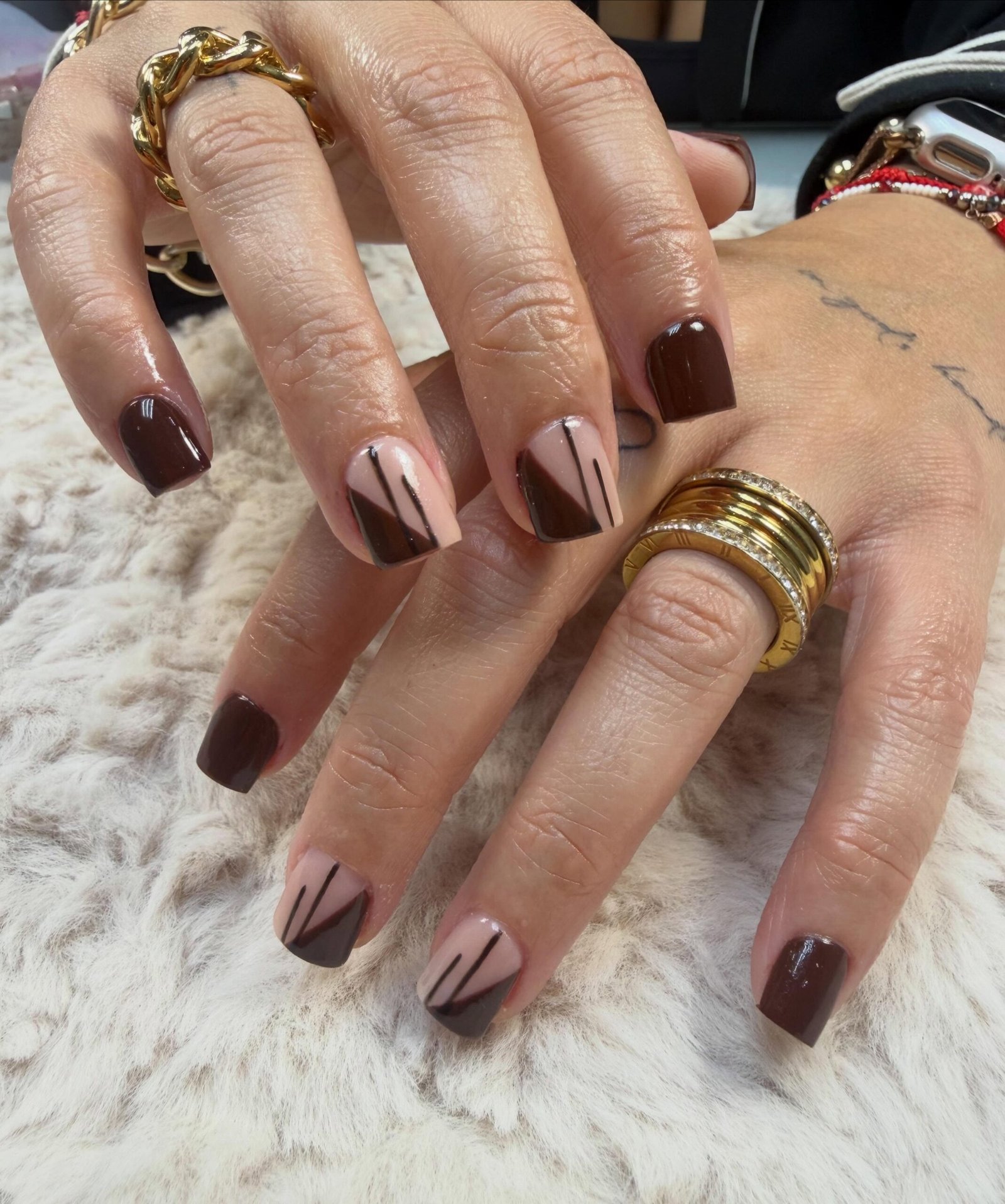 Short Brown Nails with Nude and Diagonal Accent Details