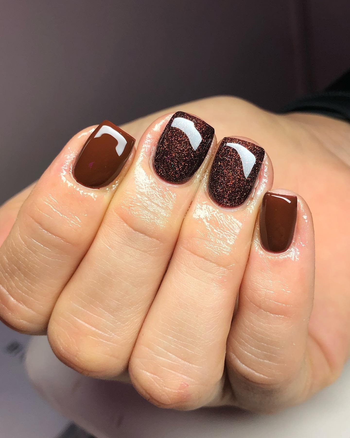 Short Brown Nails with Glitter and White Tip Accents