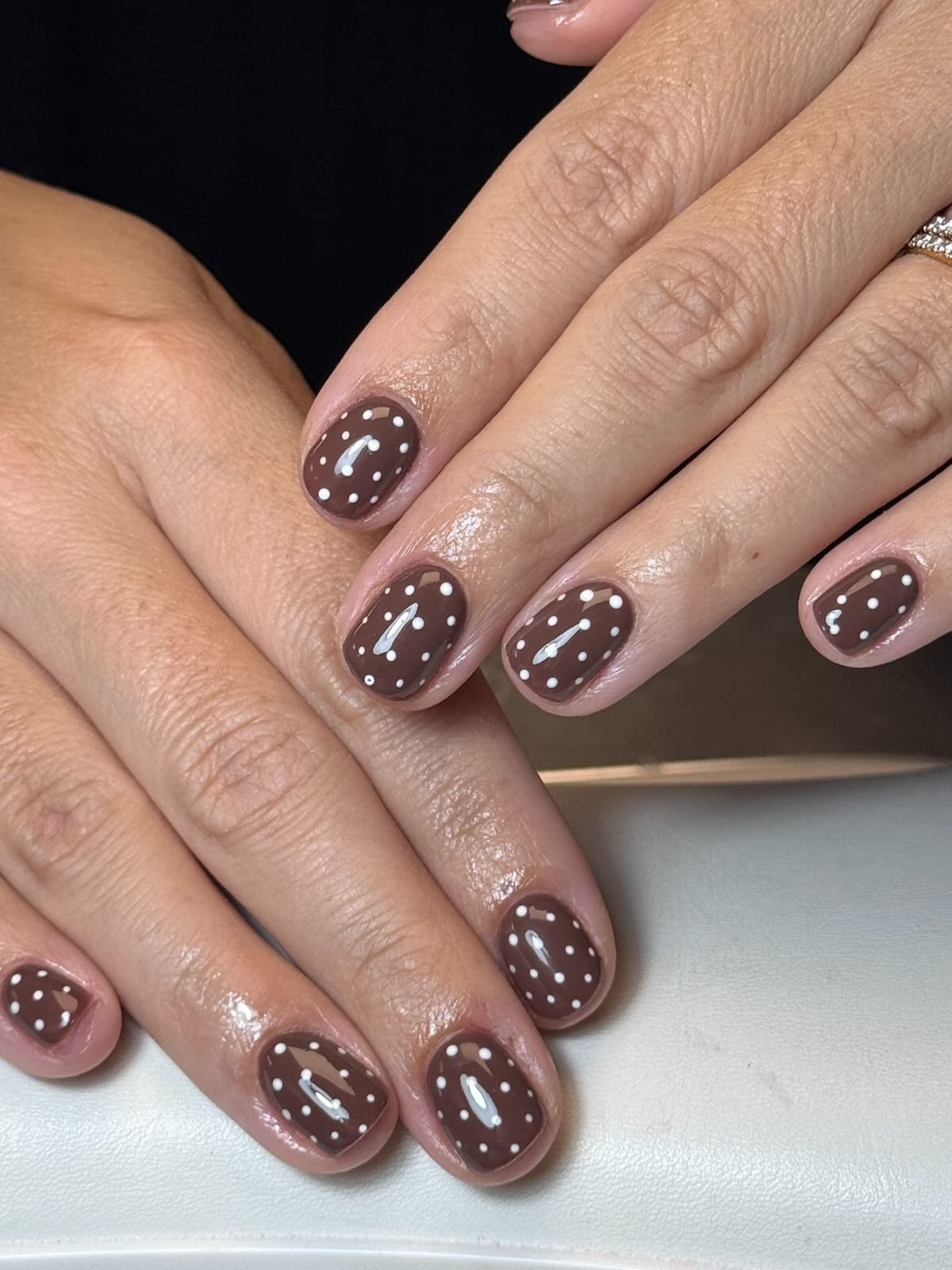 Short Taupe-Brown Nails with Delicate Dot Patterns