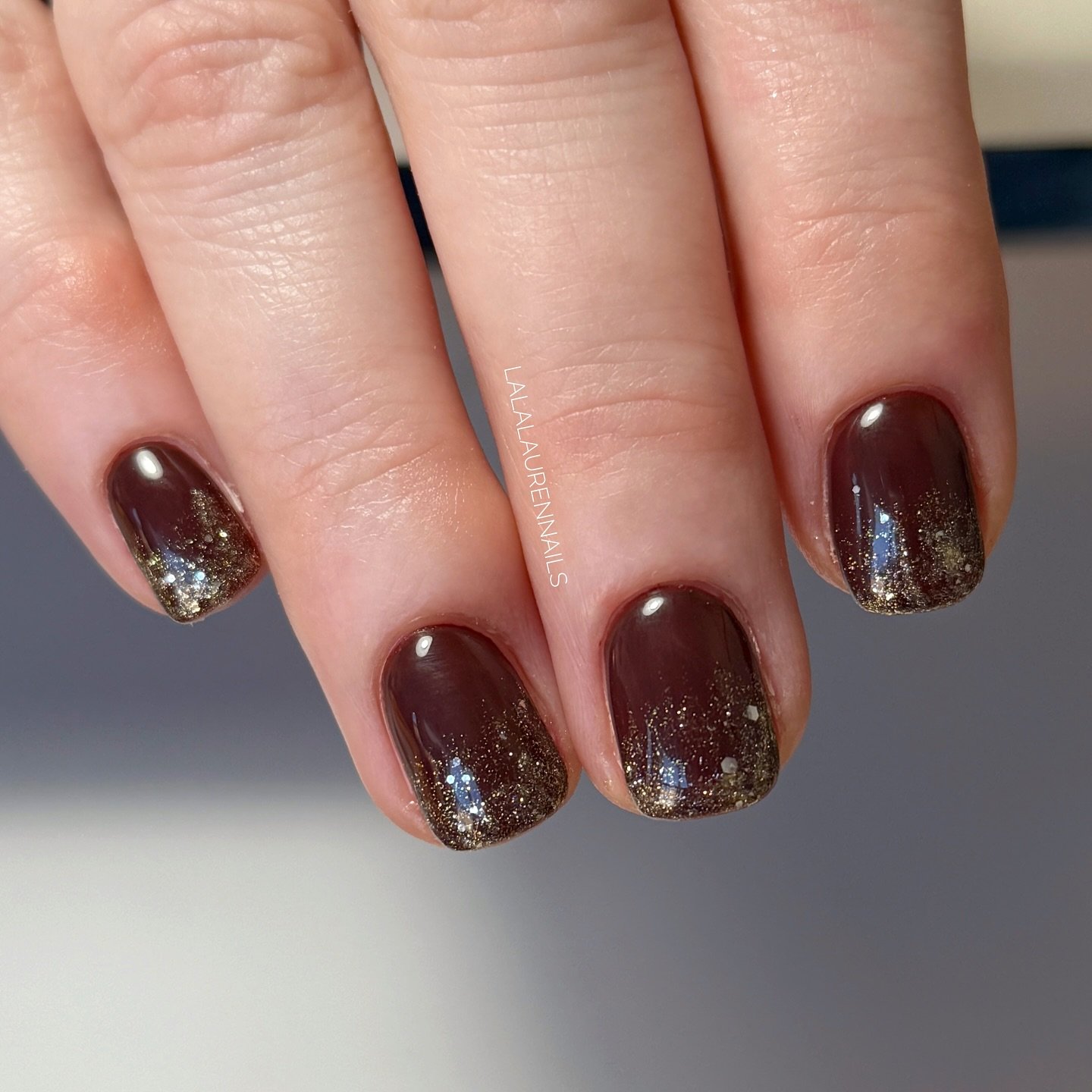 Short Deep Brown Nails with Fine Glitter Tips