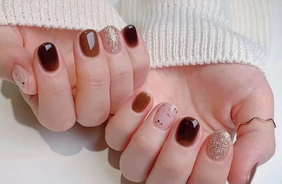 Short Brown, Nude, and Shimmer Mixed Nails