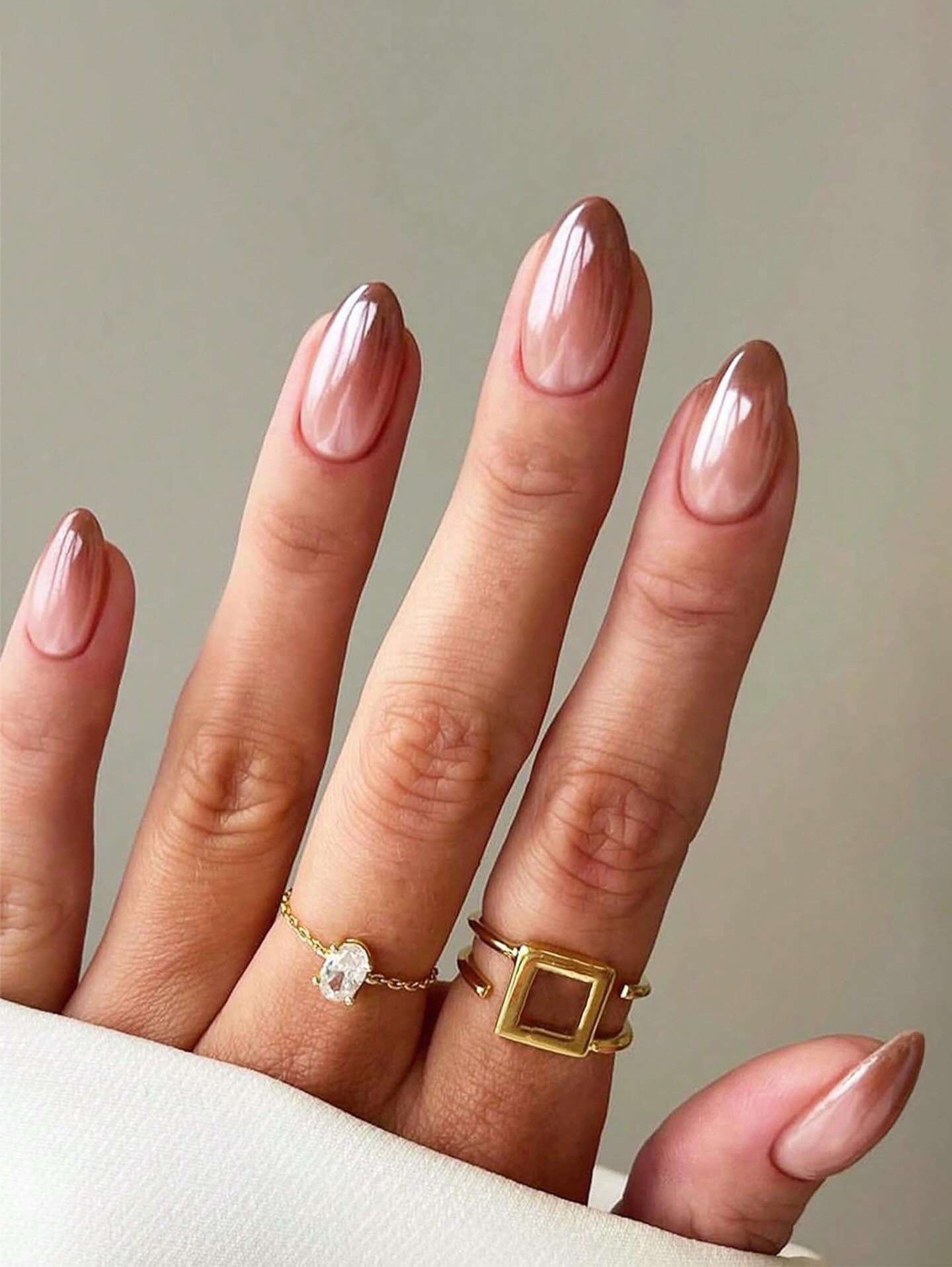 Longer Almond Nails with Sheer Pink and Brown Tones