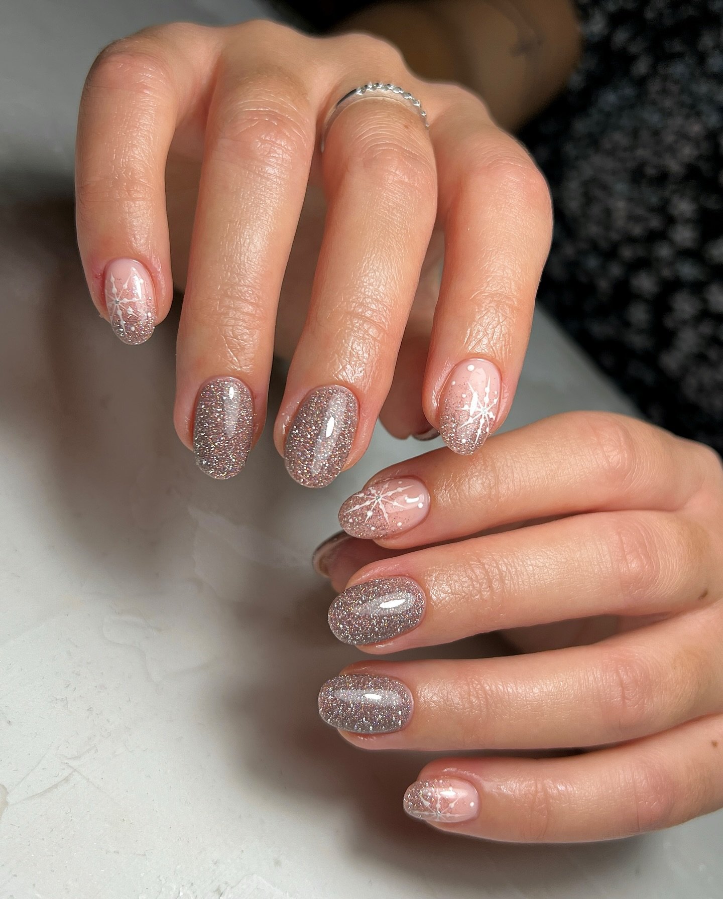Silver Christmas nails idea 1: Soft Pink Nails with Silver Glitter Shimmer