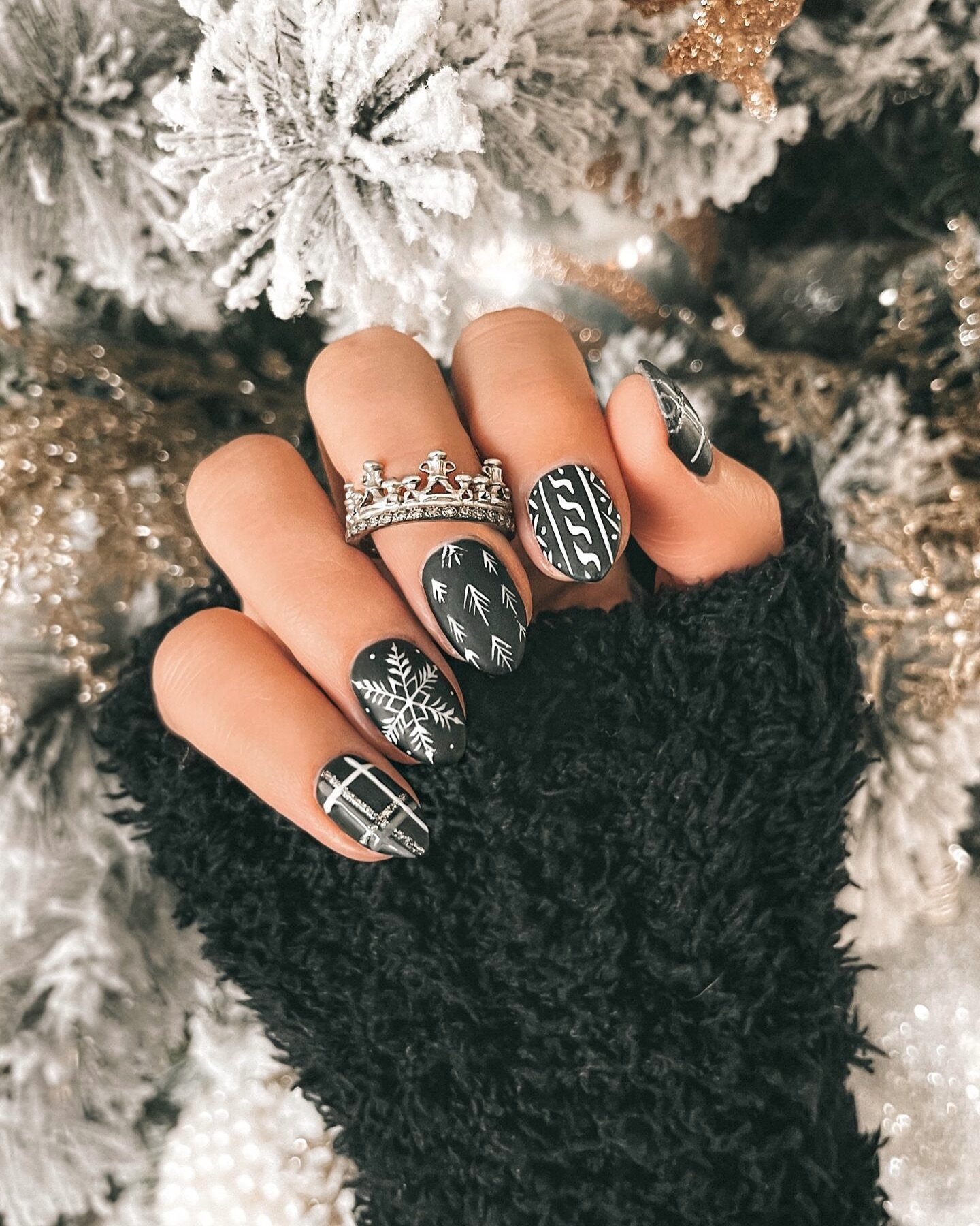 Silver Christmas nails idea 13: Black and Silver Holiday Nails with Plaid and Snowflake Details
