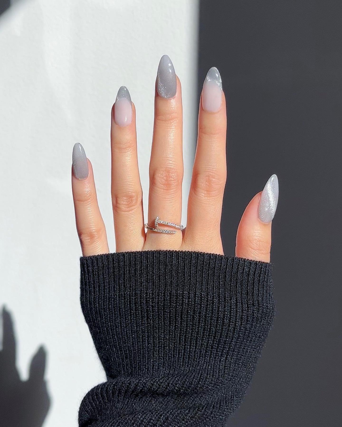 Silver Christmas nails idea 27: Long Pointed Nails with Frosted Silver Tips