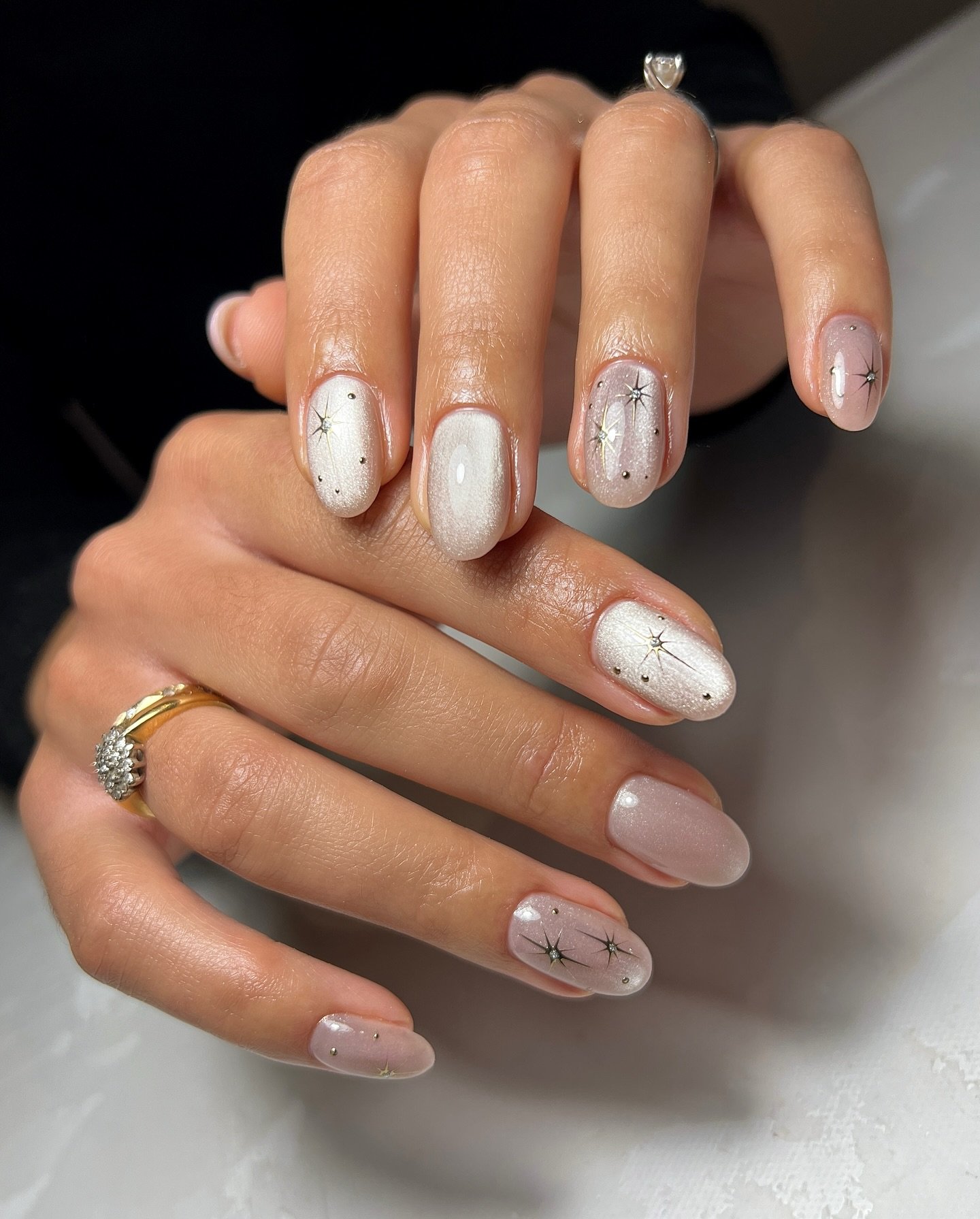 Silver Christmas nails idea 36: White and Blush Nails with Fine Silver and Star Accents