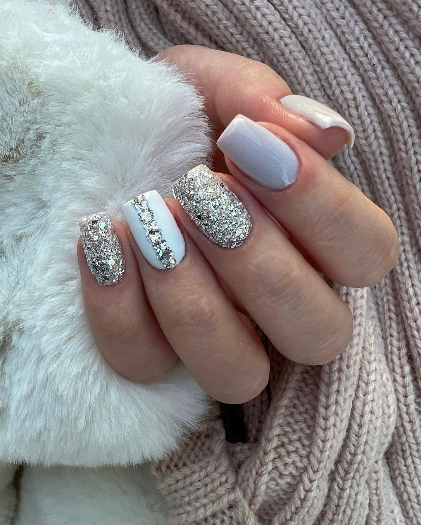 Silver Christmas nails idea 40: White and Silver Glitter Nails with Mixed Accent Textures