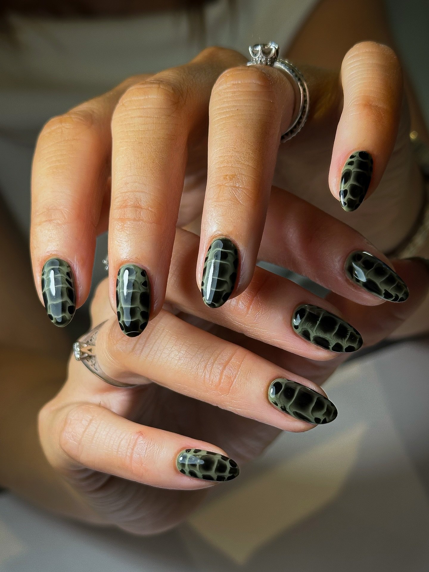 Black Nails with Green Snakeskin Accents