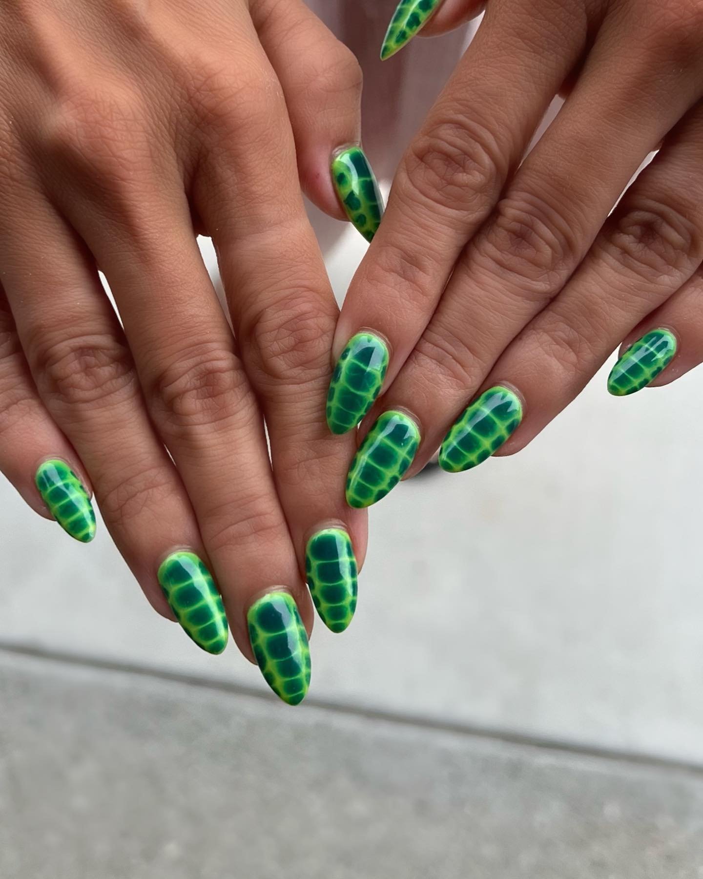 Bright Green Snakeskin Almond Nails